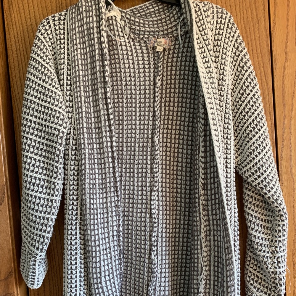 grey and white cardigan